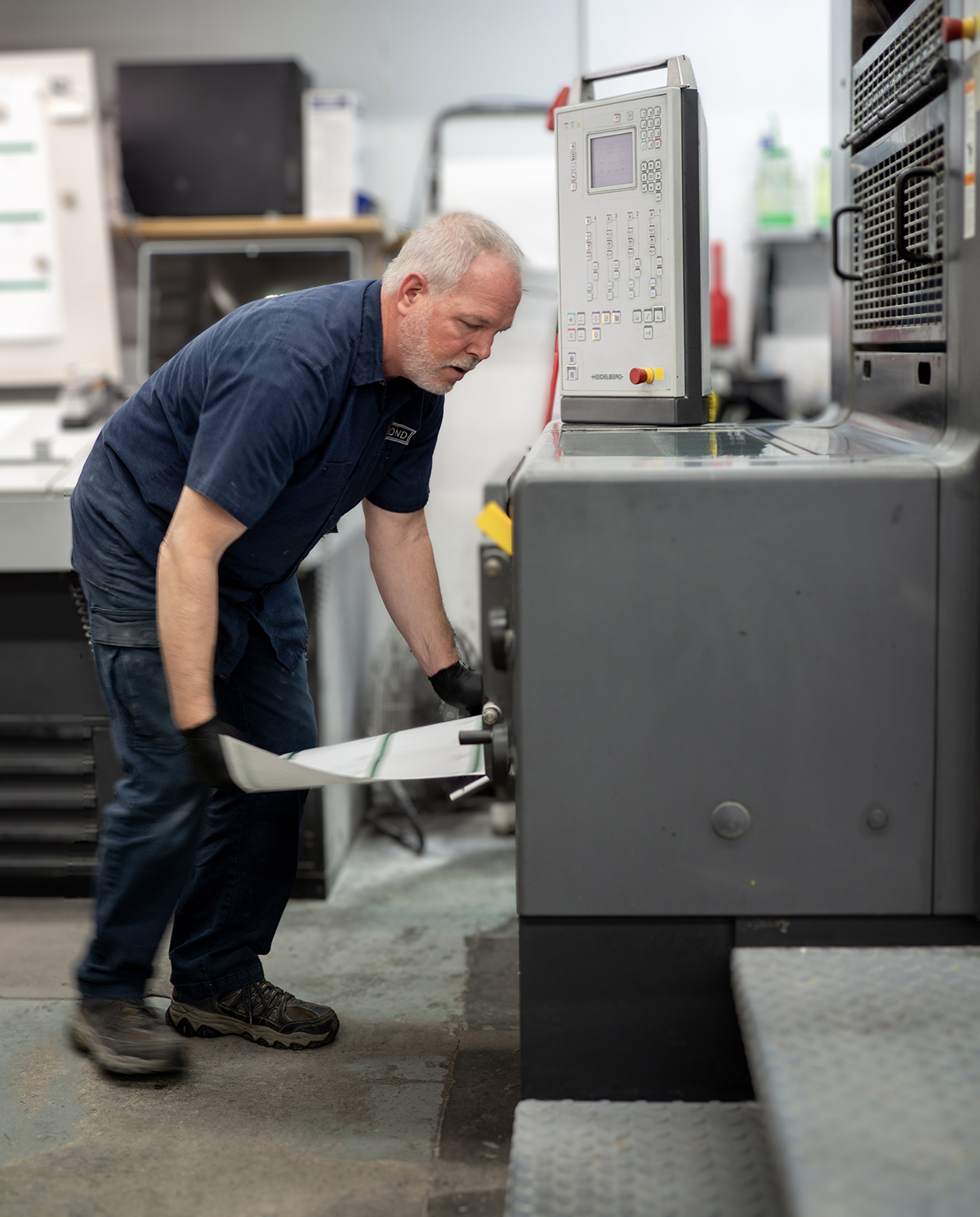About us. Behind the scenes in production - offset printing.