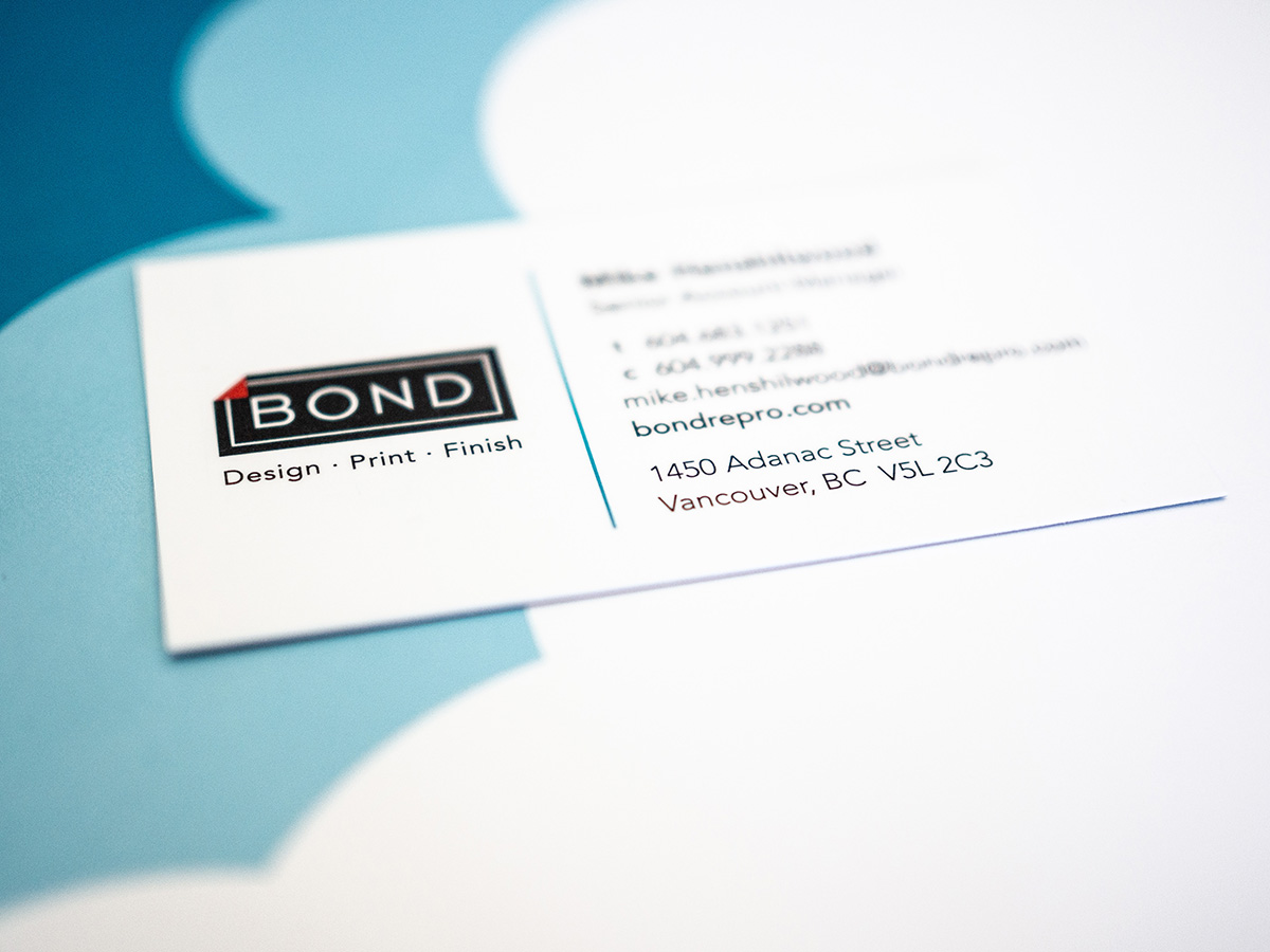 Close up of a business card printing at Bond
