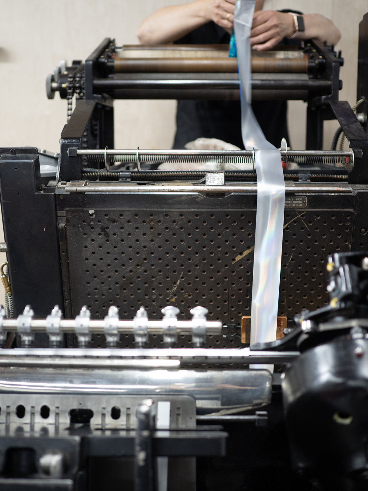 Custom foiling services in Vancouver at Bond Reproductions. Behind the scenes.